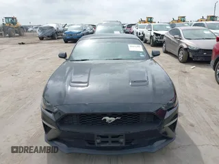 2020 Ford Mustang EcoBoost z VIN 1FA6P8TH6L5181768, wystawiony jako IAAI lot #41871296 z przebiegiem 55 131 mil mil oraz . Historia ofert i sprzedaży dostępna na DreamBid. Obrazek 12.