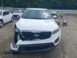 2017 Kia Sorento LX z VIN 5XYPGDA57HG197895, wystawiony jako IAAI lot #42265132 z przebiegiem 100 154 mil mil oraz . Historia ofert i sprzedaży dostępna na DreamBid. Obrazek 13.