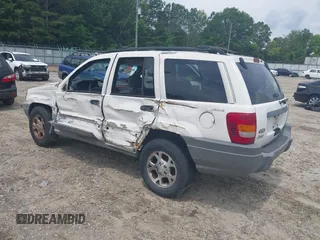 1999 Jeep Grand Cherokee Laredo with VIN 1J4GW58S3XC505985, listed as a IAAI auction lot 42399619 with 253,876 mi miles and . Bid and sale history available at DreamBid. Image 3.
