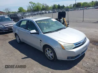 2008 Ford Focus SE with VIN 1FAHP35N88W271973, listed as a IAAI auction lot 42090204 with 261,457 mi miles. Bid and sale history available at carsss.com. Image 1.