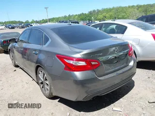 2016 Nissan Altima SR with VIN 1N4AL3AP0GC132991, listed as a IAAI auction lot 42058890 with 185,597 mi miles and . Bid and sale history available at carsss.com. Image 3.