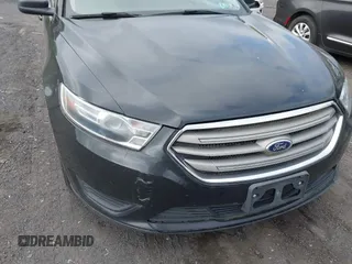 2014 Ford Taurus SE z VIN 1FAHP2D87EG165025, wystawiony jako IAAI lot #42226401 z przebiegiem 209 411 mil mil oraz . Historia ofert i sprzedaży dostępna na DreamBid. Obrazek 6.