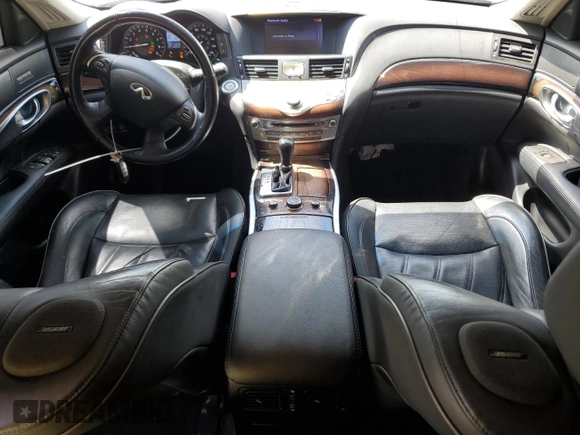 2012 Infiniti M Hybrid with VIN JN1EY1AP0CM910697, listed as a Copart auction lot 60821335 with 145,533 mi miles and Salvage title. Bid and sale history available at DreamBid. Image 8.