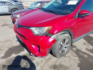 2017 Toyota RAV4 XLE with VIN 2T3RFREV5HW684792, listed as a IAAI auction lot 41692376 with 125,511 mi miles. Bid and sale history available at carsss.com. Image 6.