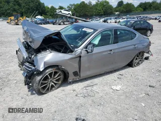 2023 Genesis G70 2.0T with VIN KMTG34TA4PU128151, listed as a Copart auction lot 63452615 with 50,393 mi miles and Salvage title. Bid and sale history available at DreamBid. Image 1.