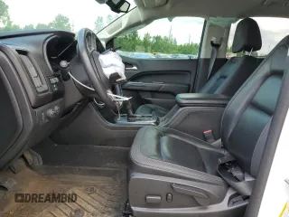 2021 GMC Canyon 4WD AT4 z VIN 1GTG6FEN9M1147406, wystawiony jako Copart lot #55454634 z przebiegiem 82 898 mil mil oraz Szkody całkowita. Historia ofert i sprzedaży dostępna na DreamBid. Obrazek 7.