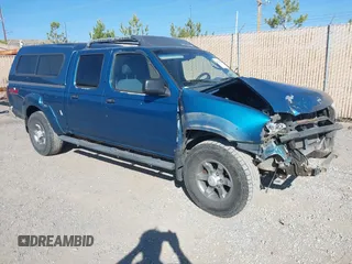 2004 Nissan Frontier XE z VIN 1N6ED29Y043438341, wystawiony jako IAAI lot #42383706 z przebiegiem 264 232 mil mil oraz . Historia ofert i sprzedaży dostępna na DreamBid. Obrazek 1.