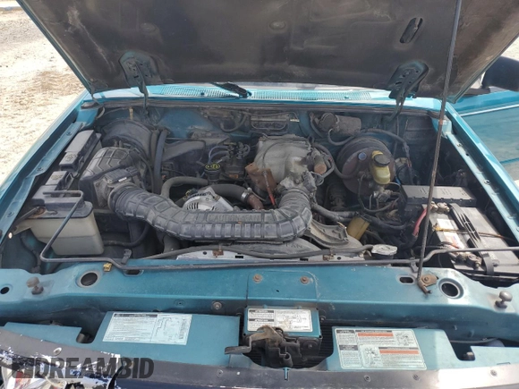1994 Ford Ranger Splash z VIN 1FTCR11X7RTB12634, wystawiony jako Copart lot #53813435 z przebiegiem 183 609 mil mil oraz Szkoda całkowita • Salvage title. Historia ofert i sprzedaży dostępna na DreamBid. Obrazek 11.