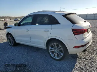 2015 Audi Q3 Prestige with VIN WA1FFCFS3FR001175, listed as a Copart auction lot 76915744 with 75,428 mi miles and Salvage title. Bid and sale history available at DreamBid. Image 2.