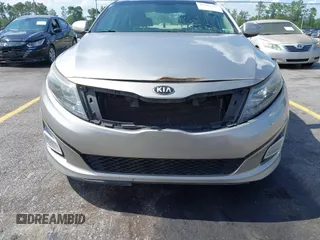 2015 Kia Optima LX with VIN 5XXGM4A79FG477619, listed as a IAAI auction lot 42561432 with 125,274 mi miles and . Bid and sale history available at DreamBid. Image 6.