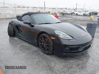 2021 Porsche 718 Boxster GTS 4.0 z VIN WP0CD2A87MS232610, wystawiony jako IAAI lot #41237419 z przebiegiem 17 555 mil mil oraz . Historia ofert i sprzedaży dostępna na DreamBid. Obrazek 1.