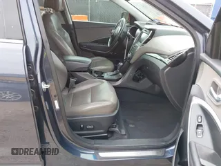 2013 Hyundai Santa Fe Sport z VIN 5XYZW3LAXDG066096, wystawiony jako IAAI lot #41717516 z przebiegiem 135 922 mil mil oraz . Historia ofert i sprzedaży dostępna na DreamBid. Obrazek 5.