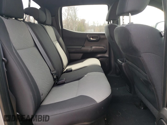 2021 Toyota Tacoma SR z VIN 5TFCZ5AN7MX272231, wystawiony jako Copart lot #52739255 z przebiegiem 67 414 mil mil oraz Szkoda całkowita • Salvage title. Historia ofert i sprzedaży dostępna na DreamBid. Obrazek 10.