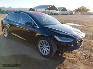 2019 Tesla Model X 75D with VIN 5YJXCAE29KF186356, listed as a IAAI auction lot 41829702 with 56,765 mi miles. Bid and sale history available at carsss.com. Image 1.