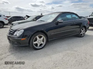 2004 Mercedes-Benz CLK 500 with VIN WDBTK75G04T005692, listed as a Copart auction lot 77038514 with 125,997 mi miles and Salvage Title. Bid and sale history available at DreamBid. Image 1.