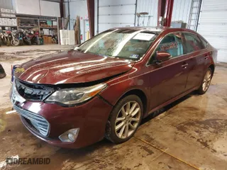 2013 Toyota Avalon XLE with VIN 4T1BK1EB0DU059112, listed as a IAAI auction lot 41553083 with 137,544 mi miles. Bid and sale history available at carsss.com. Image 2.