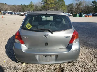 2009 Toyota Yaris with VIN JTDKT903X95240915, listed as a Copart auction lot 49143135 with 188,817 mi miles and Clean Title. Bid and sale history available at carsss.com. Image 6.