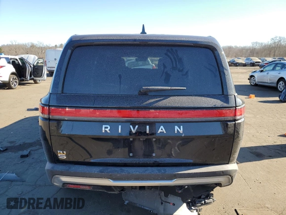 2023 Rivian R1S Adventure with VIN 7PDSGABA2PN014942, listed as a Copart auction lot 88597535 with 0 mi miles and Salvage Title. Bid and sale history available at carsss.com. Image 6.