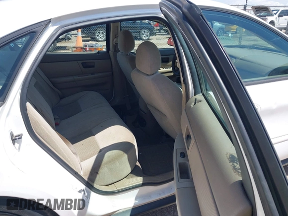 2006 Ford Taurus SE with VIN 1FAFP53U96A134869, listed as a IAAI auction lot 42185928 with 207,390 mi miles and . Bid and sale history available at DreamBid. Image 8.