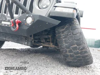 2019 Jeep Wrangler Unlimited Sahara with VIN 1C4HJXEG8KW533339, listed as a IAAI auction lot 40963653 with 69,202 mi miles and . Bid and sale history available at DreamBid. Image 6.