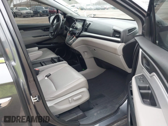 2018 Honda Odyssey EX-L with VIN 5FNRL6H72JB076597, listed as a IAAI auction lot 41838664 with 154,647 mi miles and . Bid and sale history available at DreamBid. Image 5.