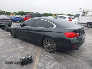 2016 BMW 4 Series 428i xDrive with VIN WBA4C9C58GG136248, listed as a IAAI auction lot 41346270 with 129,464 mi miles and . Bid and sale history available at carsss.com. Image 3.