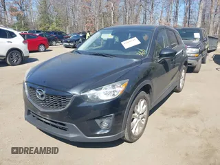 2014 Mazda CX-5 Grand Touring with VIN JM3KE4DY1E0339690, listed as a IAAI auction lot 41668780 with 216,825 mi miles. Bid and sale history available at carsss.com. Image 17.