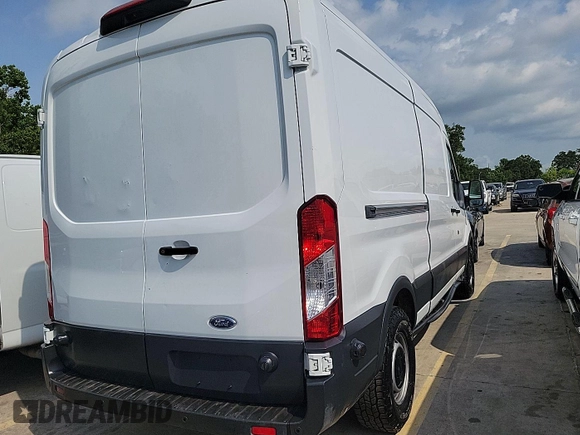 2018 Ford Transit z VIN 1FTYR2CM5JKB45950, wystawiony jako IAAI lot #42532710 z przebiegiem 98 554 mil mil oraz . Historia ofert i sprzedaży dostępna na DreamBid. Obrazek 30.