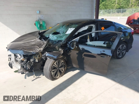 2016 Honda Civic EX-L z VIN 2HGFC1F76GH650308, wystawiony jako IAAI lot #42408661 z przebiegiem Nie podano mil oraz . Historia ofert i sprzedaży dostępna na DreamBid. Obrazek 17.