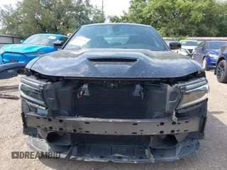 2023 Dodge Charger GT with VIN 2C3CDXHG1PH529771, listed as a IAAI auction lot 42159336 with 55,162 mi miles and . Bid and sale history available at DreamBid. Image 13.