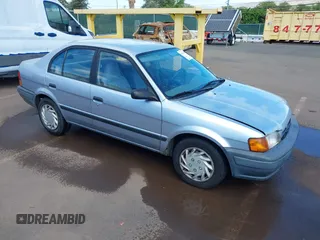 1997 Toyota Tercel DX z VIN JT2BC52L3V0242284, wystawiony jako IAAI lot #41736573 z przebiegiem 65 264 mil mil oraz . Historia ofert i sprzedaży dostępna na DreamBid. Obrazek 1.