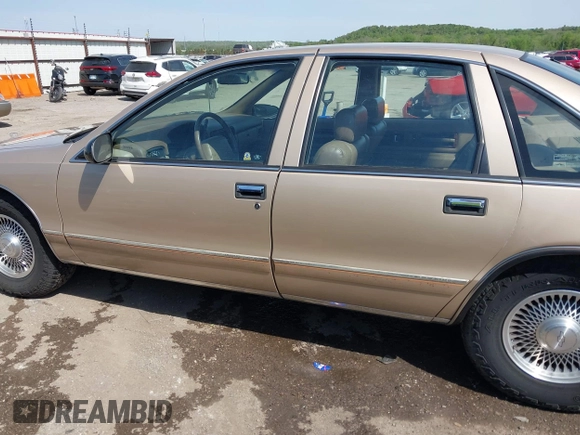 1996 Chevrolet Caprice Classic 1SA Special Value Pkg with VIN 1G1BL52P9TR190980, listed as a IAAI auction lot 42019775 with 135,432 mi miles. Bid and sale history available at carsss.com. Image 14.