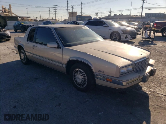 1988 Cadillac Eldorado with VIN 1G6EL1153JU612185, listed as a Copart auction lot 83786144 with 133,882 mi miles and Salvage Title. Bid and sale history available at DreamBid. Image 4.
