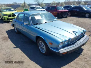 1984 Jaguar XJ with VIN SAJAV1349EC378142, listed as a IAAI auction lot 41861373 with 118,350 mi miles and . Bid and sale history available at DreamBid. Image 1.