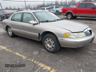 2002 Lincoln Continental z VIN 1LNHM97V32Y627465, wystawiony jako IAAI lot #41744638 z przebiegiem 173 759 mil mil oraz . Historia ofert i sprzedaży dostępna na DreamBid. Obrazek 1.