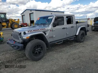 2020 Jeep Gladiator Rubicon z VIN 1C6JJTBG2LL105582, wystawiony jako Copart lot #56404465 z przebiegiem 97 524 mil mil oraz Szkoda całkowita • Salvage title. Historia ofert i sprzedaży dostępna na DreamBid. Obrazek 1.