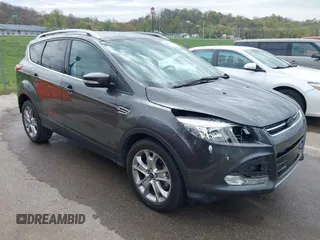 2015 Ford Escape Titanium with VIN 1FMCU0J90FUA25086, listed as a IAAI auction lot 41993681 with 126,170 mi miles. Bid and sale history available at carsss.com. Image 1.