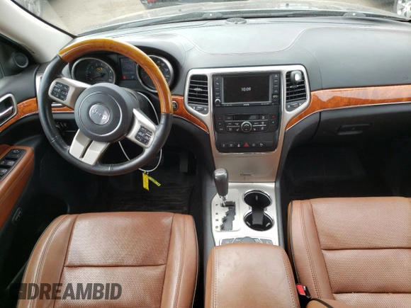 2011 Jeep Grand Cherokee Overland with VIN 1J4RR6GT9BC660730, listed as a Copart auction lot 53770745 with 106,351 mi miles and Salvage title. Bid and sale history available at DreamBid. Image 8.