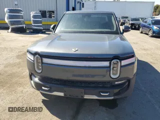 2022 Rivian R1T Adventure z VIN 7FCTGAAA5NN014843, wystawiony jako Copart lot #47668545 z przebiegiem 42 640 mil mil oraz Szkody całkowita. Historia ofert i sprzedaży dostępna na DreamBid. Obrazek 5.