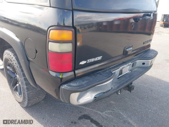 2004 Chevrolet Tahoe LT with VIN 1GNEC13ZX4J106072, listed as a IAAI auction lot 41703828 with 275,081 mi miles. Bid and sale history available at carsss.com. Image 6.
