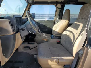 1999 Jeep Wrangler Sport with VIN 1J4FY19S7XP464377, listed as a Copart auction lot 73062074 with 89,915 mi miles and Salvage Title. Bid and sale history available at carsss.com. Image 7.