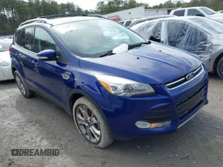 2016 Ford Escape Titanium with VIN 1FMCU9JXXGUA71898, listed as a IAAI auction lot 41758284 with 51,935 mi miles. Bid and sale history available at carsss.com. Image 1.