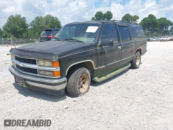 1996 Chevrolet Suburban with VIN 3GNEC16R3TG120004, listed as a IAAI auction lot 42752410 with 291,491 mi miles and . Bid and sale history available at DreamBid. Image 2.