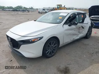 2023 Mazda 3 S Select with VIN JM1BPAKM3P1616743, listed as a IAAI auction lot 42248005 with Not provided miles and . Bid and sale history available at DreamBid. Image 2.