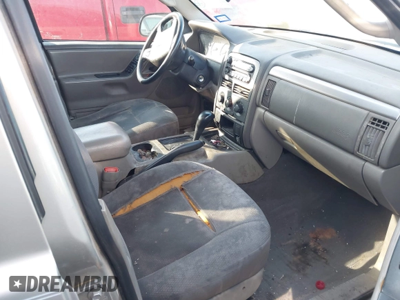2003 Jeep Grand Cherokee Laredo with VIN 1J4GX48S73C515727, listed as a IAAI auction lot 42555080 with 275,035 mi miles and . Bid and sale history available at DreamBid. Image 5.