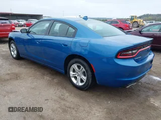 2023 Dodge Charger SXT with VIN 2C3CDXBGXPH674476, listed as a IAAI auction lot 41910339 with 14,079 mi miles. Bid and sale history available at carsss.com. Image 3.