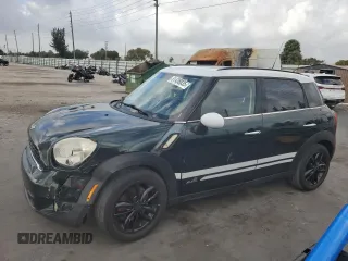 2013 MINI Countryman S ALL4 z VIN WMWZC5C58DWP31357, wystawiony jako Copart lot #51438035 z przebiegiem 98 138 mil mil oraz Szkody całkowita. Historia ofert i sprzedaży dostępna na DreamBid. Obrazek 1.