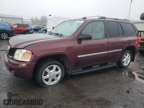 2007 GMC Envoy SLE with VIN 1GKDT13S372265140, listed as a Copart auction lot 84198914 with 256,650 mi miles and Salvage Title. Bid and sale history available at carsss.com. Image 1.