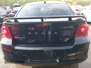 2014 Dodge Avenger SE with VIN 1C3CDZAB6EN120955, listed as a IAAI auction lot 42030602 with Not provided miles and . Bid and sale history available at DreamBid. Image 16.