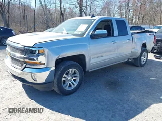 2018 Chevrolet Silverado 1500 LT with VIN 1GCVKREH4JZ323242, listed as a IAAI auction lot 41971945 with 63,915 mi miles and . Bid and sale history available at DreamBid. Image 2.